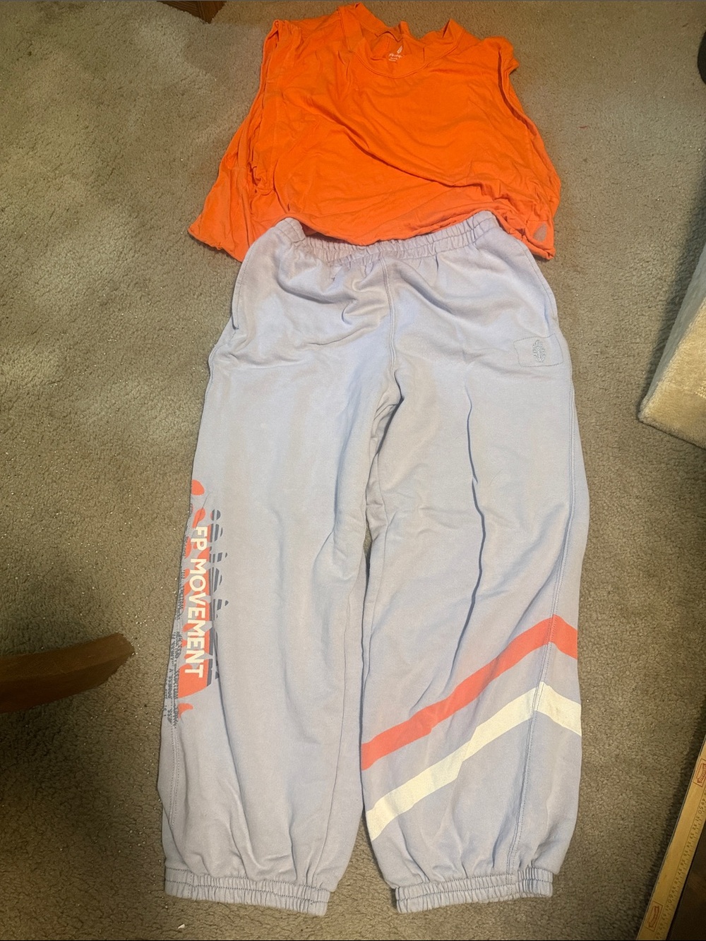 Free People Light blueJoggers with orange Stripe Accents and matching top.